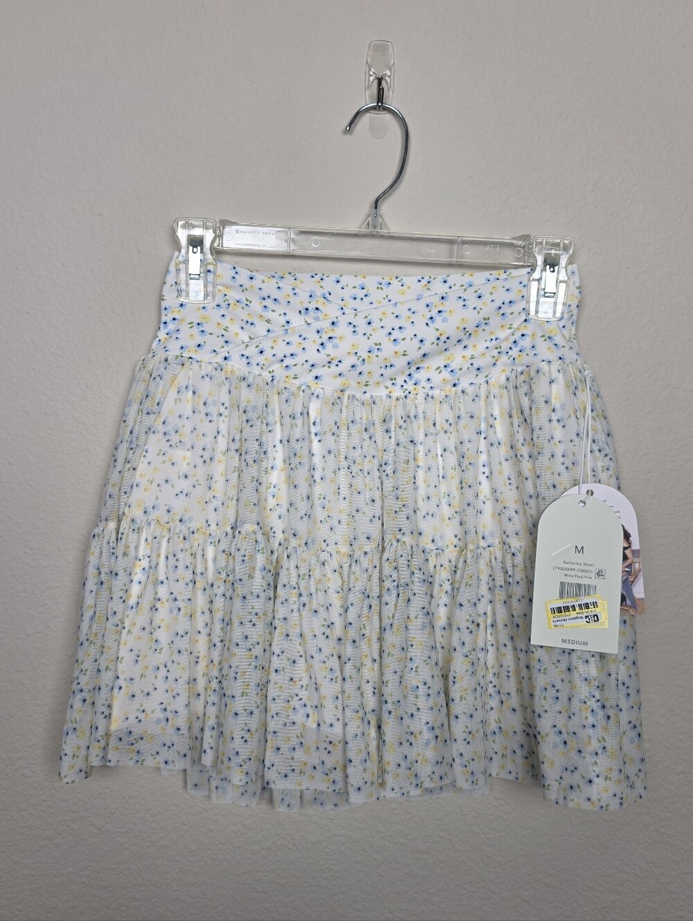 Blogilates cream and blue/yellow floral athletic skirt NWT M